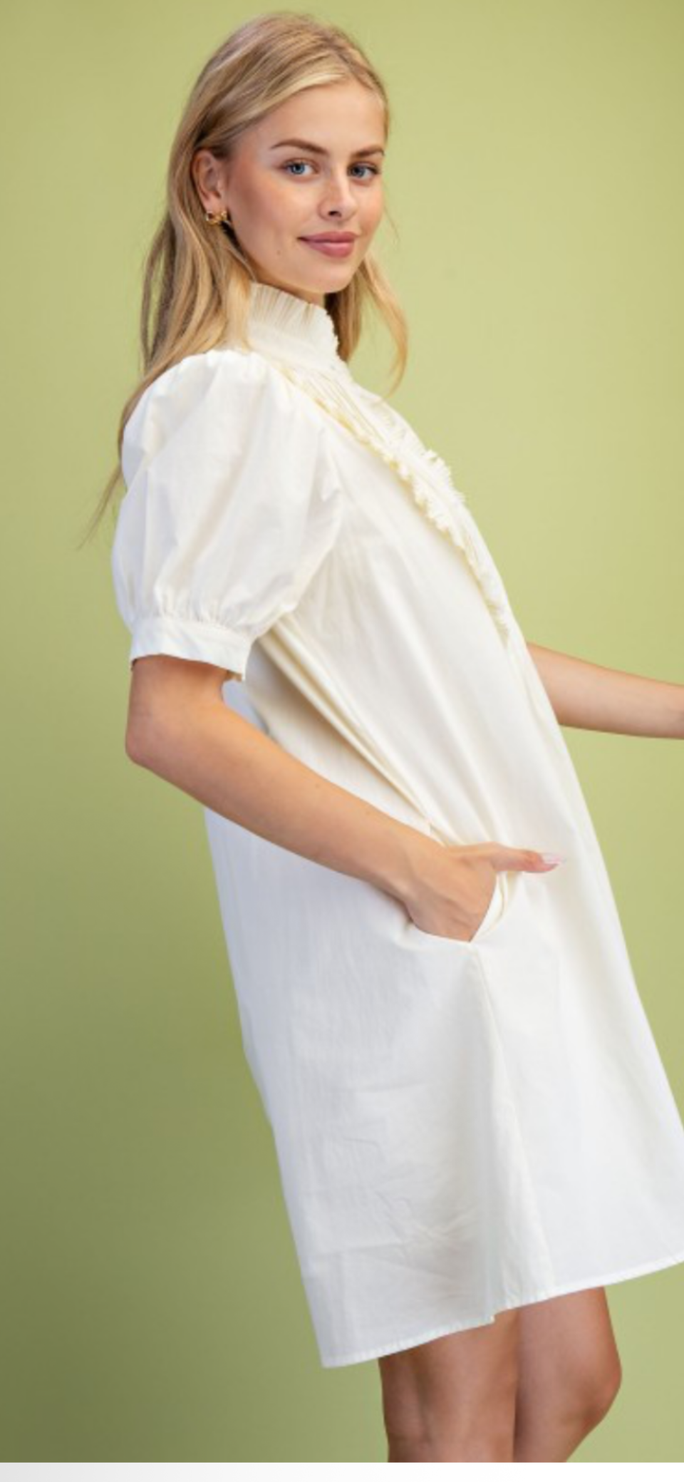 Ivory pleated fluttered neck dress