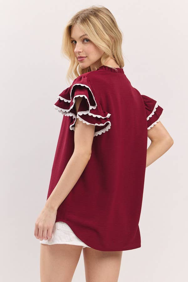 Game day scallop trim top