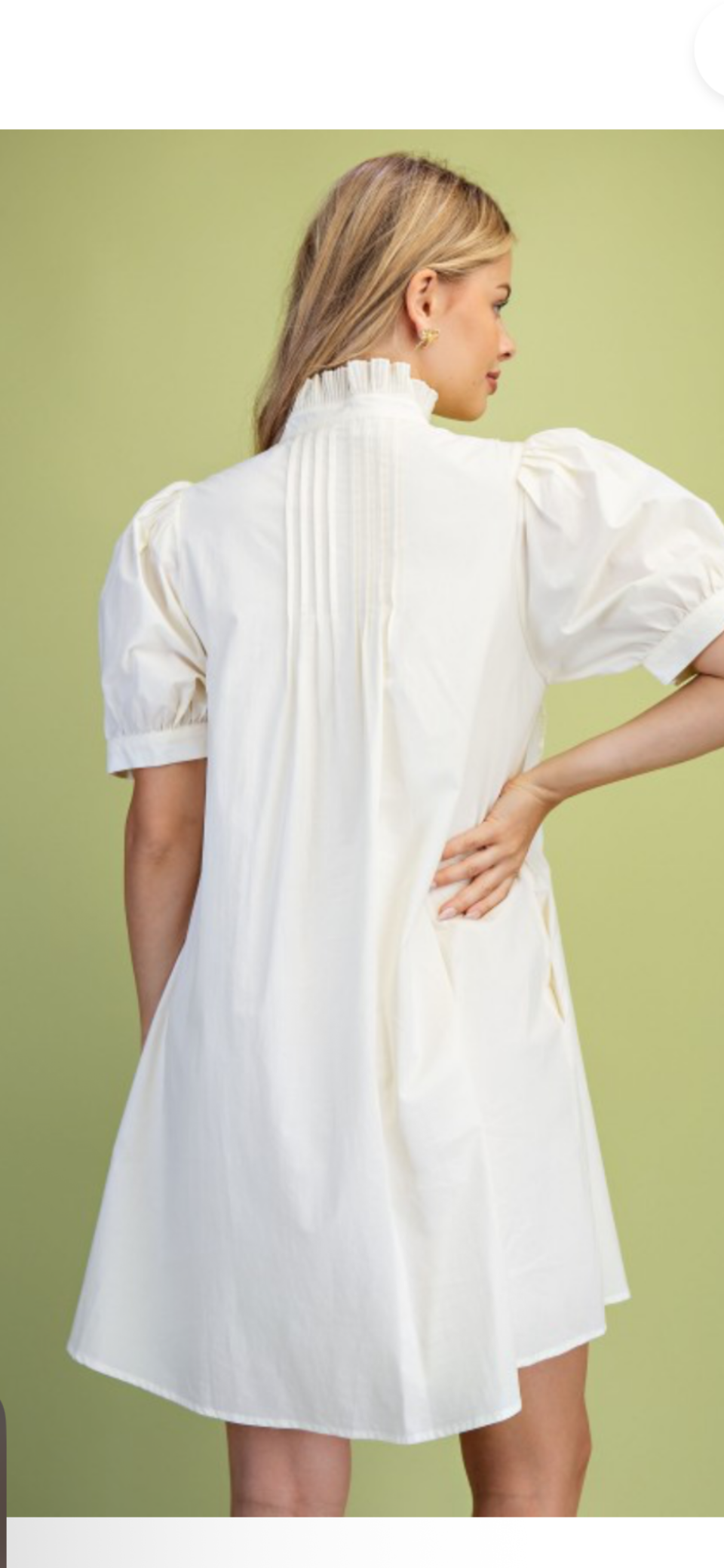 Ivory pleated fluttered neck dress