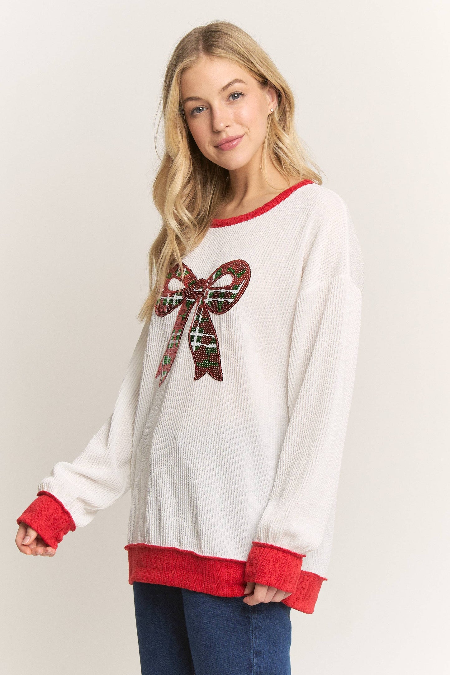 White ribbed sequin bow top